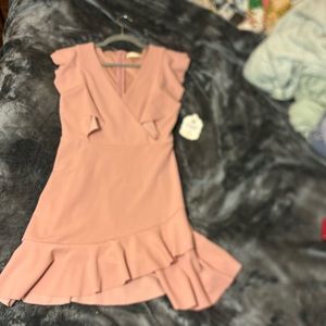 Altered state dress. Blush. Never worn with tags.  Size medium.